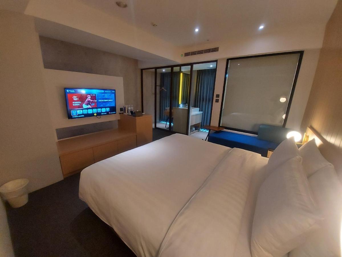 E Hotel Xinshi Exterior photo